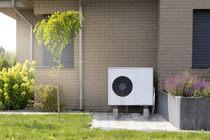 Heat Pump System Installed on Modern Building Exterior